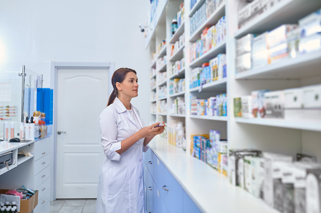 female-pharmacist-working-drugstore